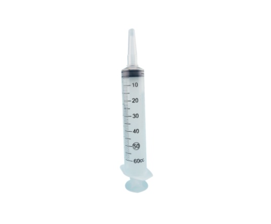 SYRINGE WITH CATHETER TIP